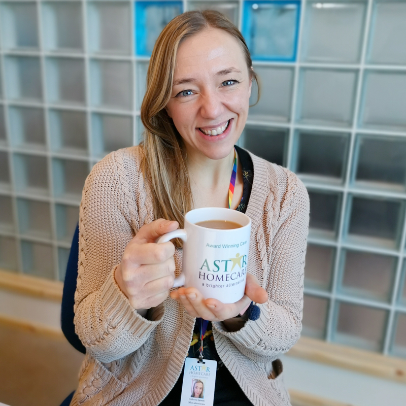 AStar-Homecare-Catherine smiling with a mug of tea