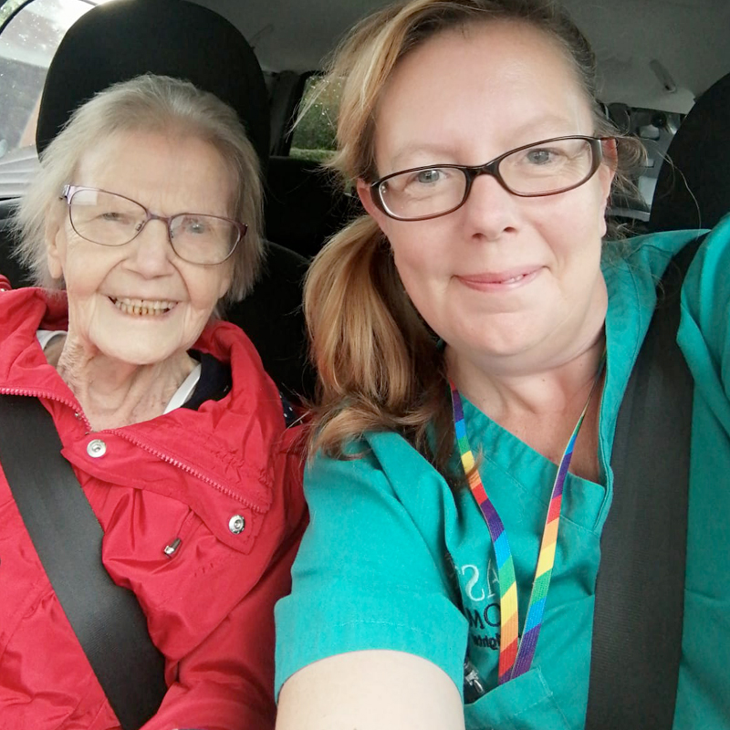 home-care-Astar staff and older lady-in-car